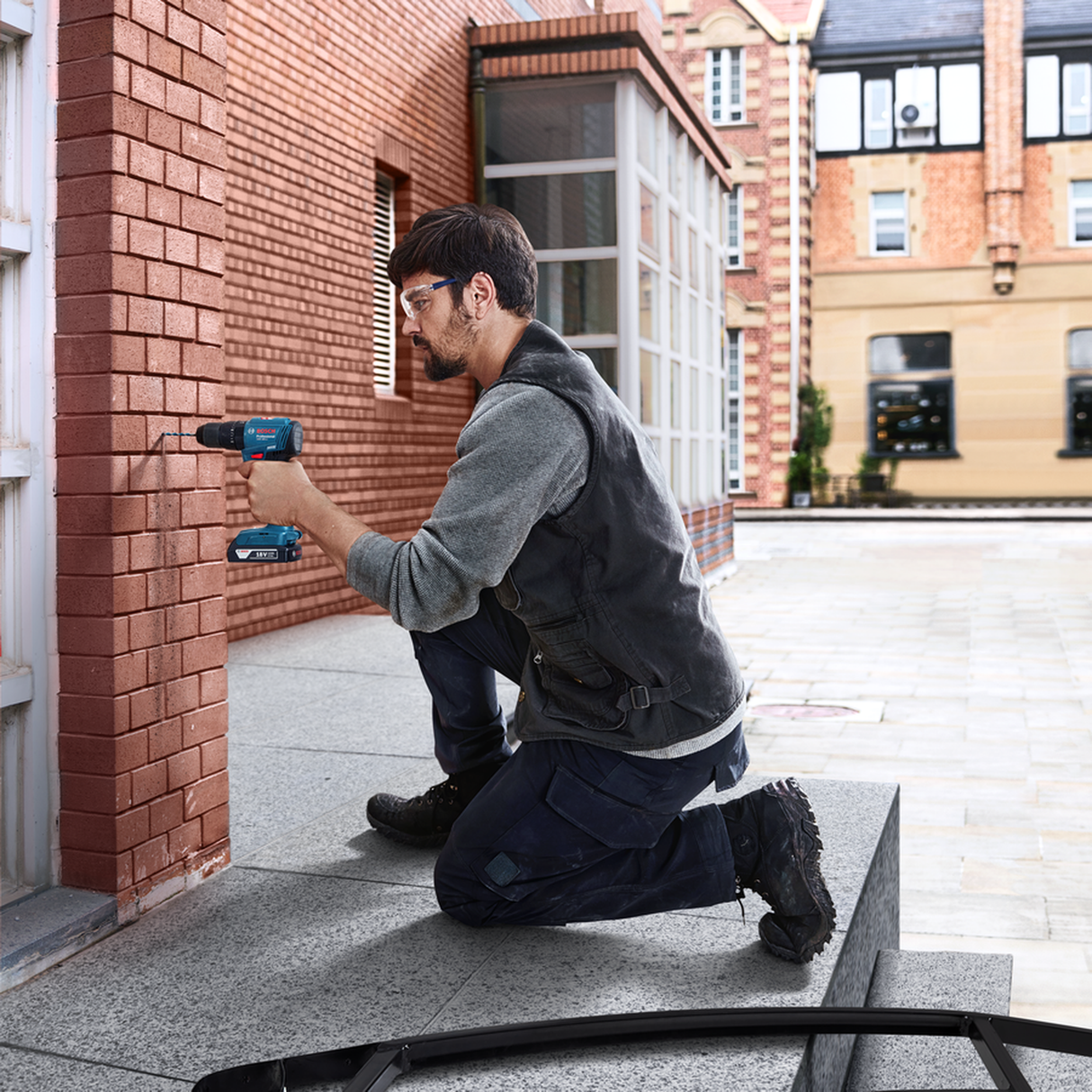 Bosch Professional 18V System Cordless Combi Drill GSB 185-LI (Brushless motor, 50Nm torque, incl. 2x 2.0Ah batteries, Charger GAL 18V-20, 23-piece accessory set, Carry case)