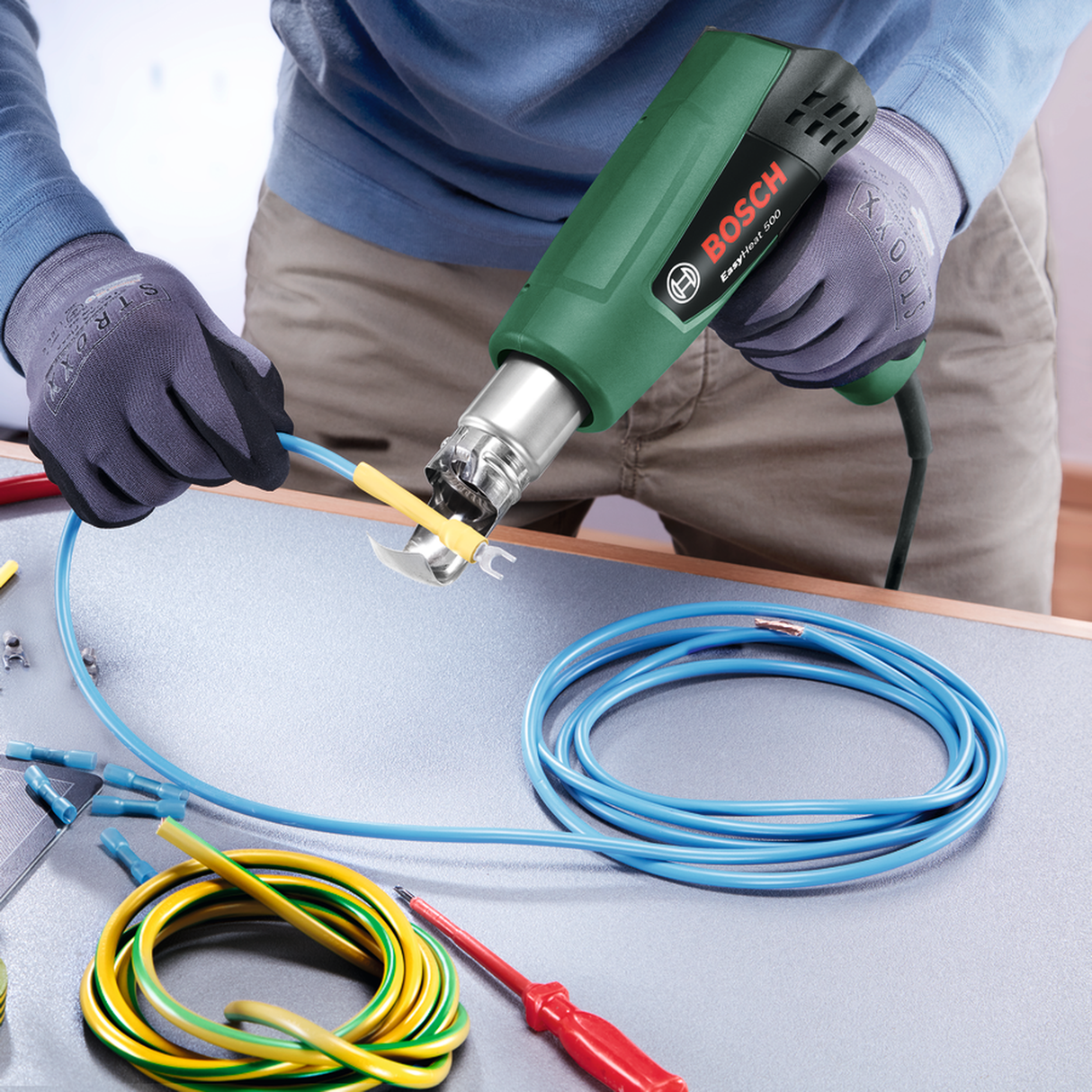 Bosch Heat Gun EasyHeat 500 (1600W, 300/500 °C temperature settings, compact and lightweight design for easy handling, thermal protection), incl. nozzle.