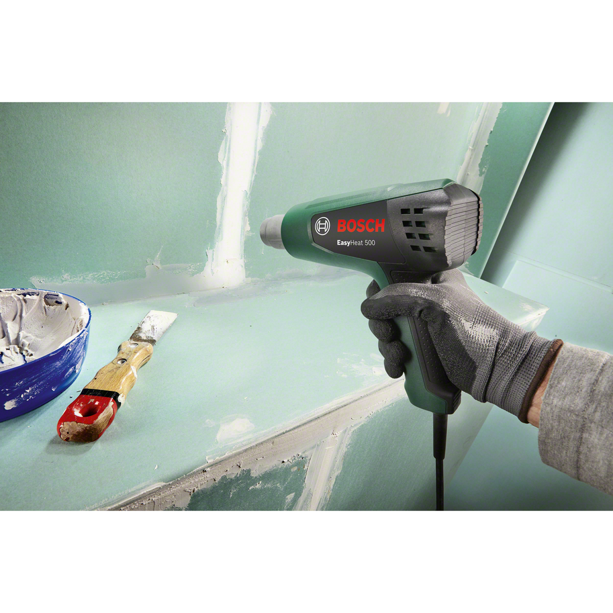 Bosch Heat Gun EasyHeat 500 (1600W, 300/500 °C temperature settings, compact and lightweight design for easy handling, thermal protection), incl. nozzle.