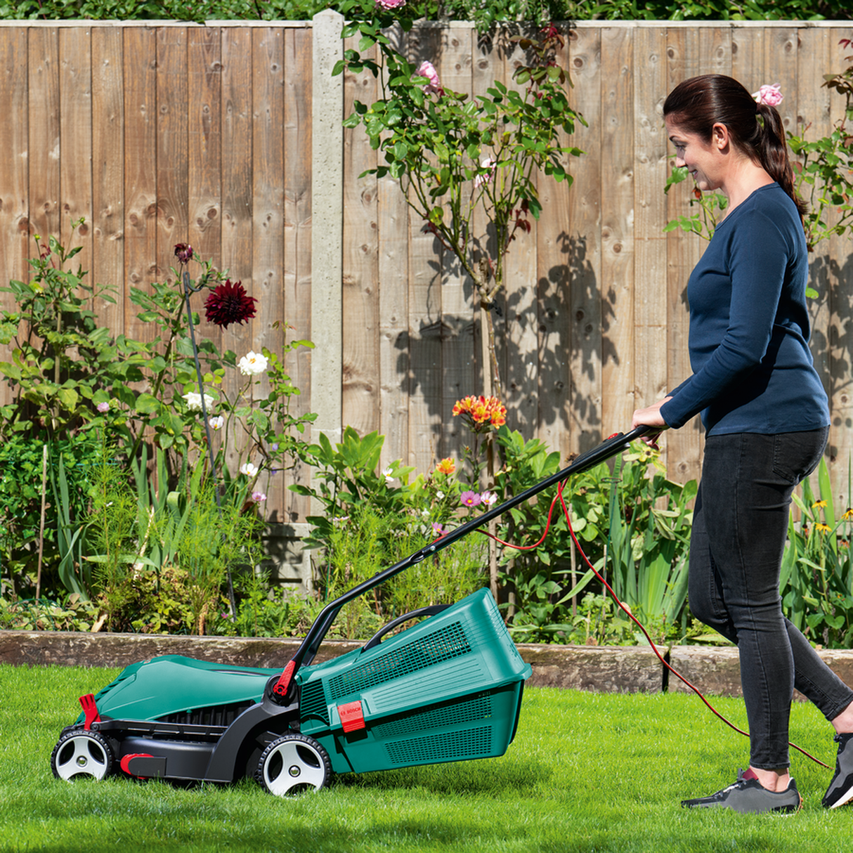 Bosch Electric Lawn Mower Rotak 34 R (1300W motor, 34cm cutting width, For efficient lawn care)