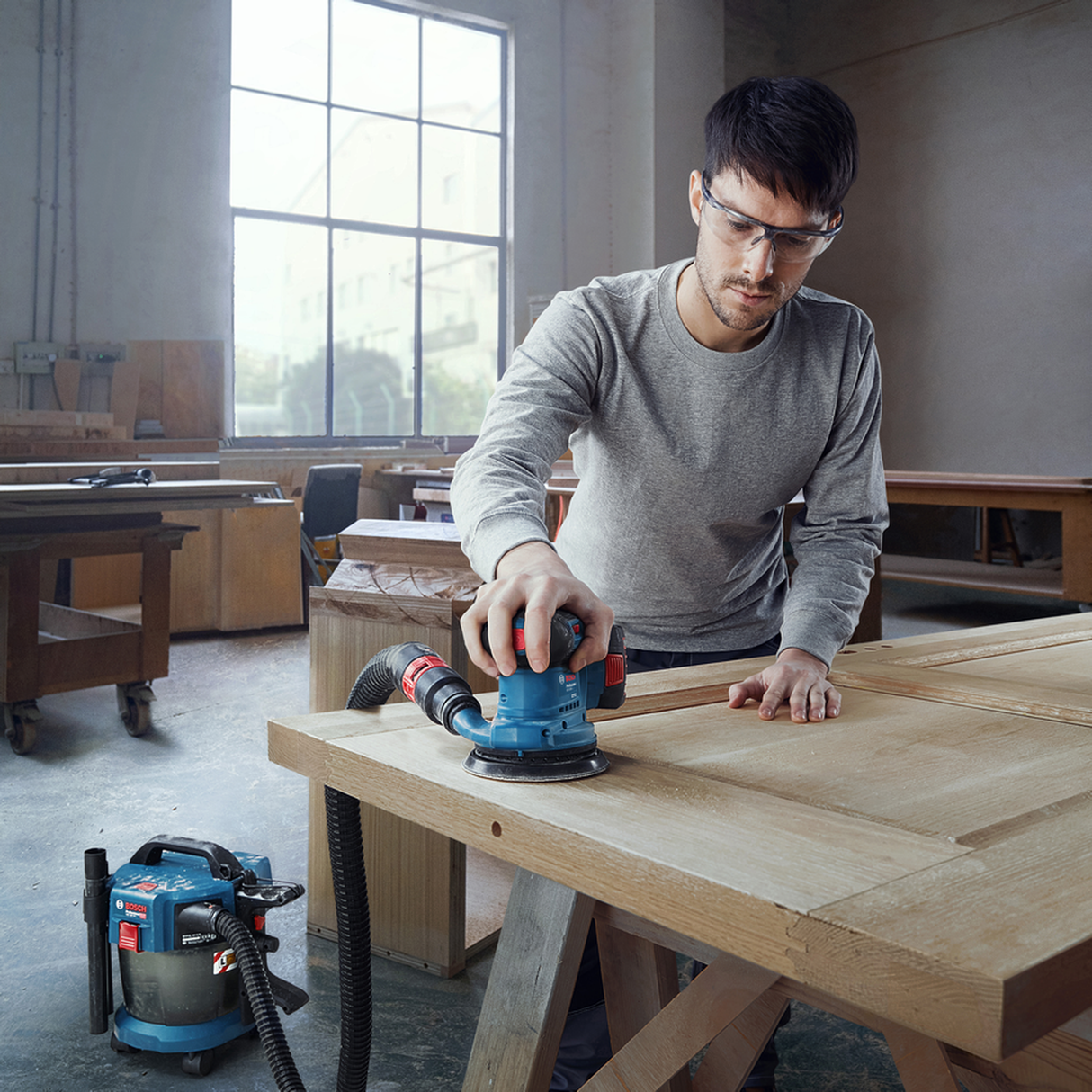 Bosch Professional Cordless Random Orbit Sander GEX 185-LI (18V System, Solo/Body only, Carton, For versatile sanding)