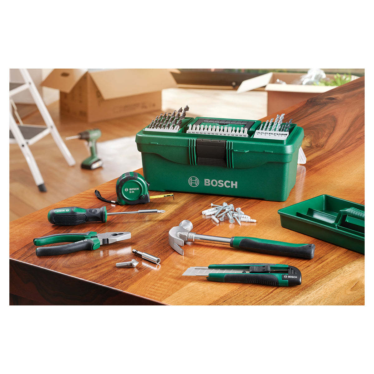 Bosch DIY Starter Box 73pcs (comprehensive set of essential tools and accessories for various DIY projects, includes screwdriver bits, drill bits, plugs, screws, and hand tools), all organized in a robust and portable case.
